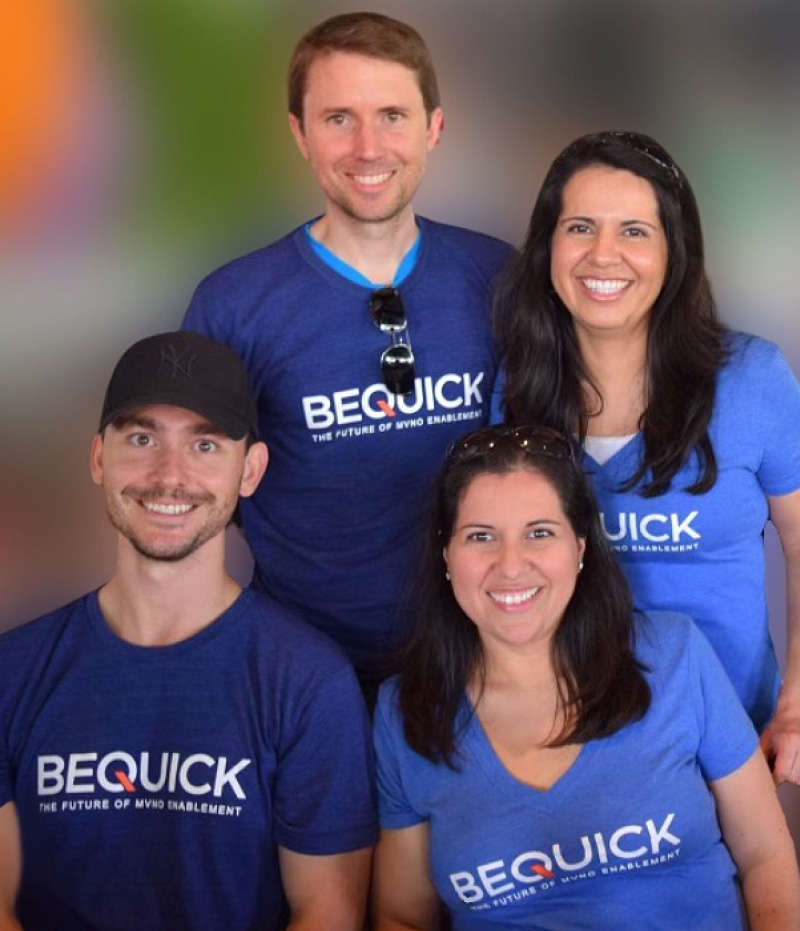 Sean Biganski with members of the BeQuick team